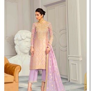A brand new, never worn, banarsi three piece shalwar kameez by Kanwal Malik.